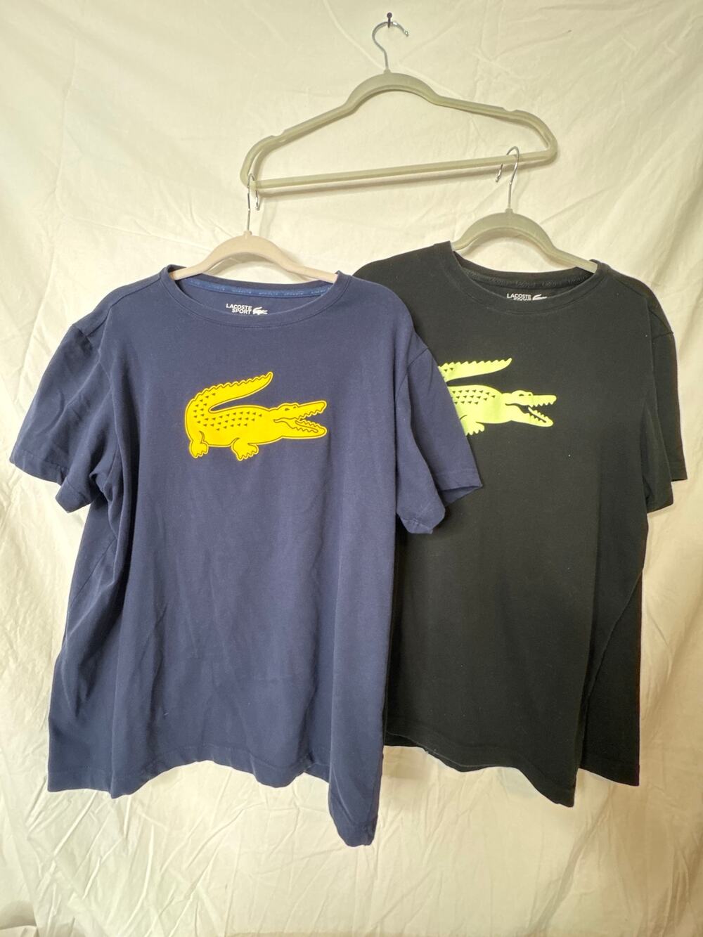 2 LACOSTE TSHIRTS (BLACK AND NAVY) US SIZE: XL